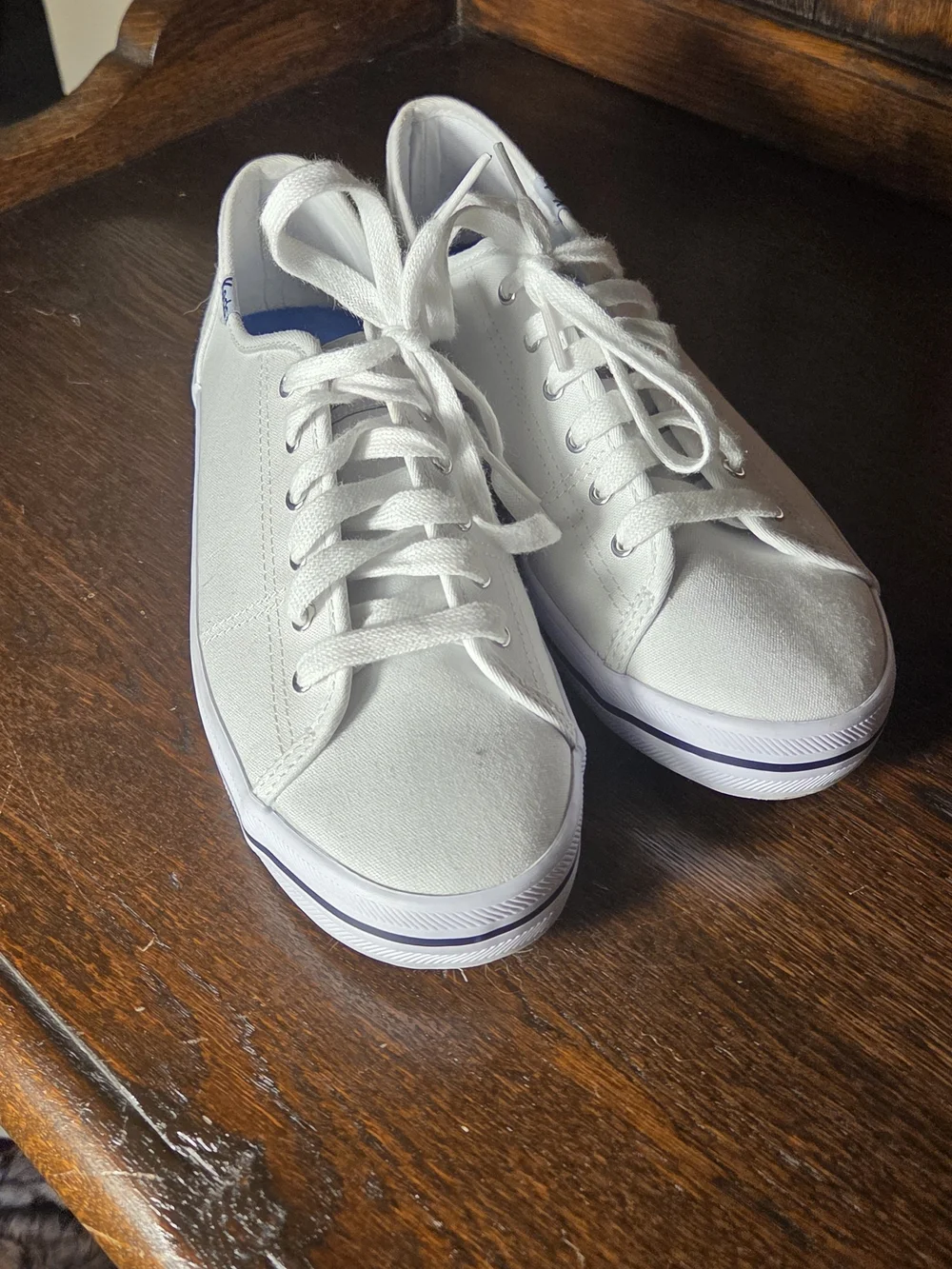 Keds Women's White Kickstart Canvas Low-Top Sneakers with Subtle Blue Trim.